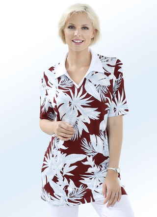 Poloshirt mit seitlich abgerundetem Saumabschluss