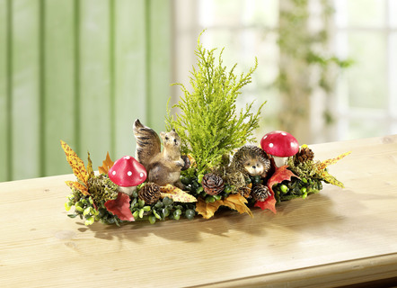 Tischaufleger mit herbstlichen Gräsern und Blättern