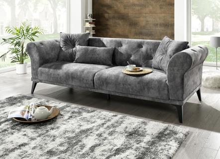 Stilvolles Schlafsofa mit Dekokissen