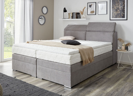 Bett mit Stauraum im Kopfteil