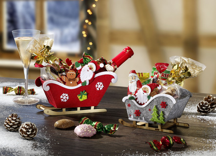 Weihnachts-Schlitten mit Weihnachtsleckereien