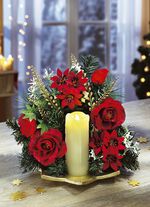 Tischgesteck mit Weihnachtssternblüten 