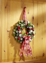 Wandkranz mit kleinen Marienkäfern aus Holz