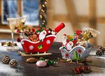 Weihnachts-Schlitten mit Weihnachtsleckereien 