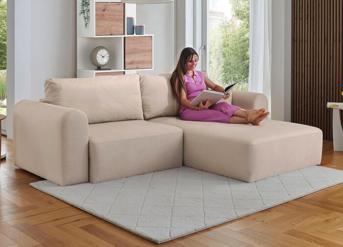 Polsterecke mit Bettfunktion und Dekokissen 