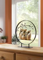 Dekorative Eulenfamilie unter Zweig 