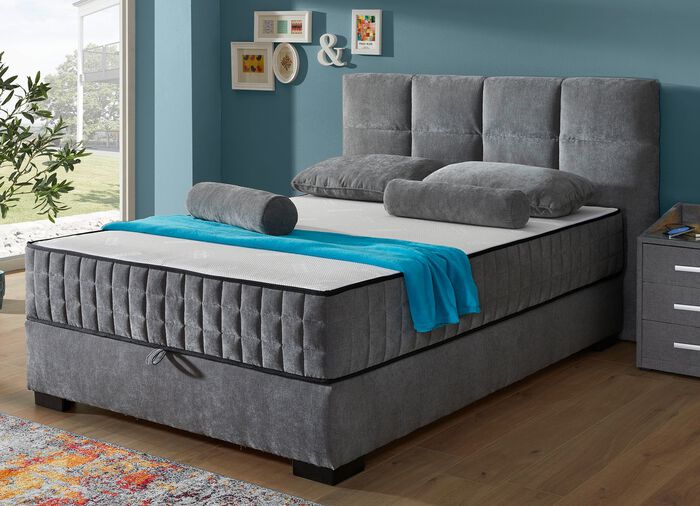 Boxspringbett mit Wendematratze und Bettkasten 