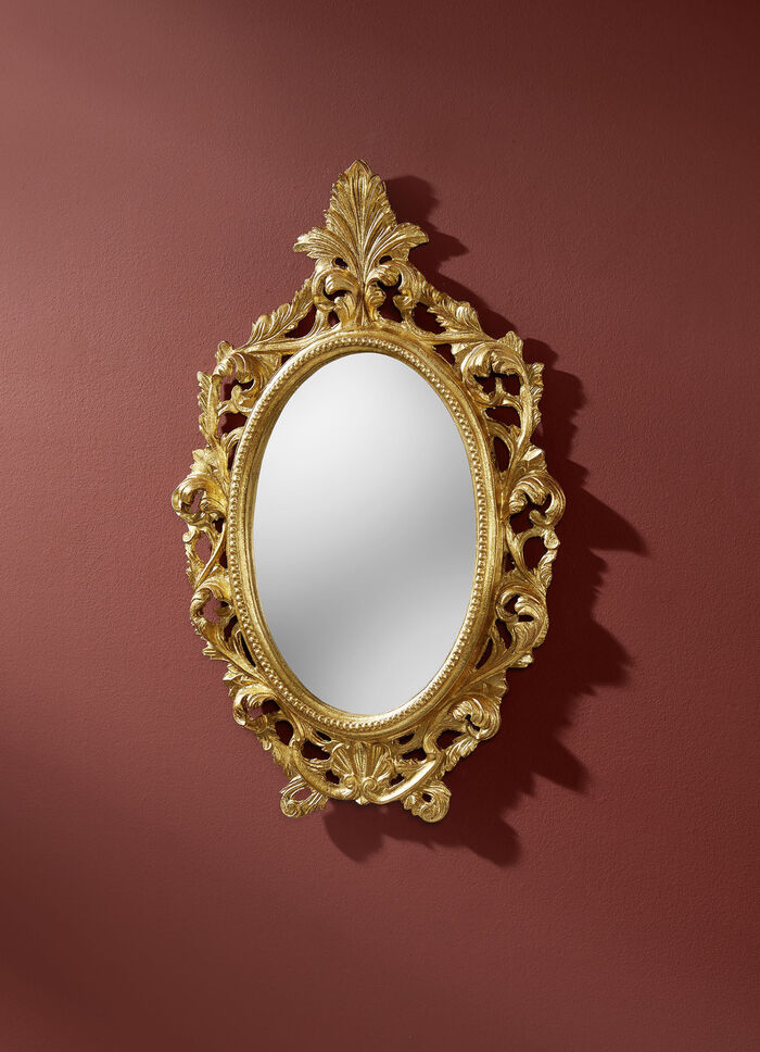 Spiegel mit goldfarben verzierten Rahmen 