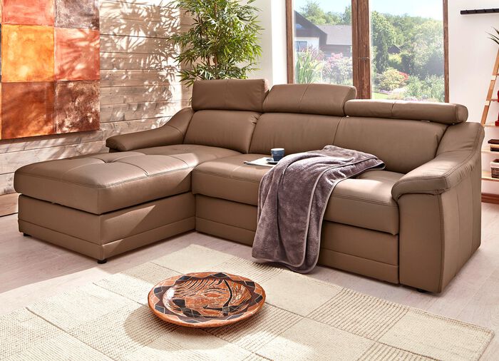 Frei im Raum aufstellbare Polsterecke mit Kopfteilverstellung 