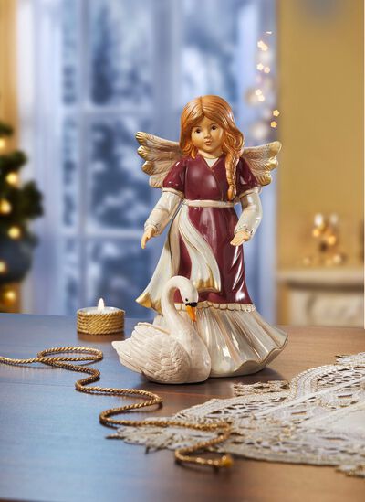 Engel mit Schwan aus Feinsteingut 