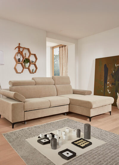 Polsterecke mit Bettfunktion und Bettkasten in der Ottomane 