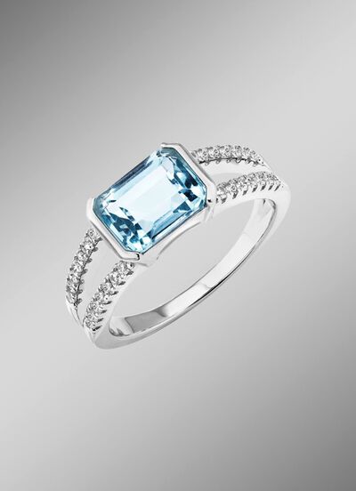 Eleganz trifft auf Zeitlosigkeit: Damenring mit Blautopas und synth. Zirkonia 